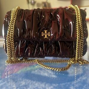 Kira patent ruched mini flap bag